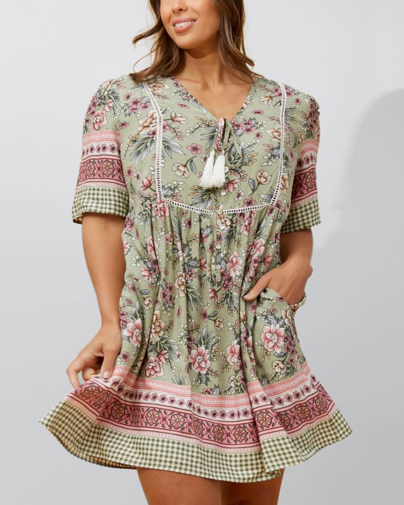 Front of a model wearing a size 3X Gloria Short Dress A-Line Floral Print Green in Green by ANNICK. | dia_product_style_image_id:352517